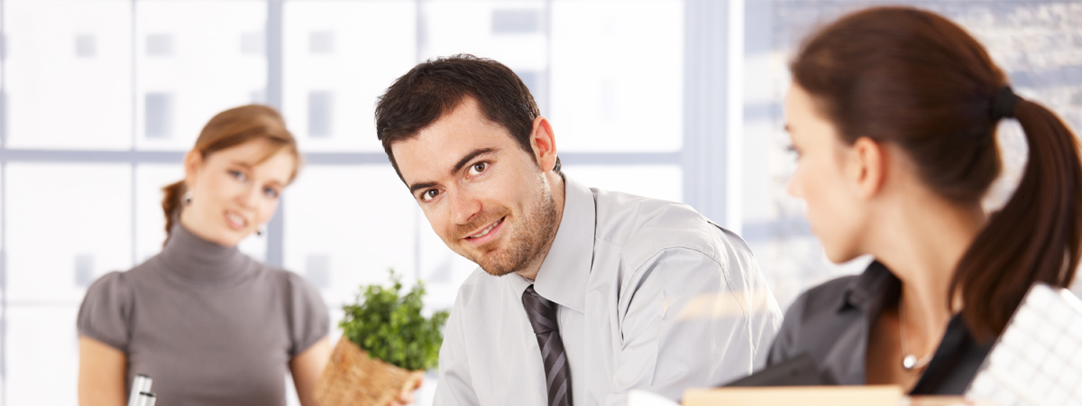 Business employees smiling