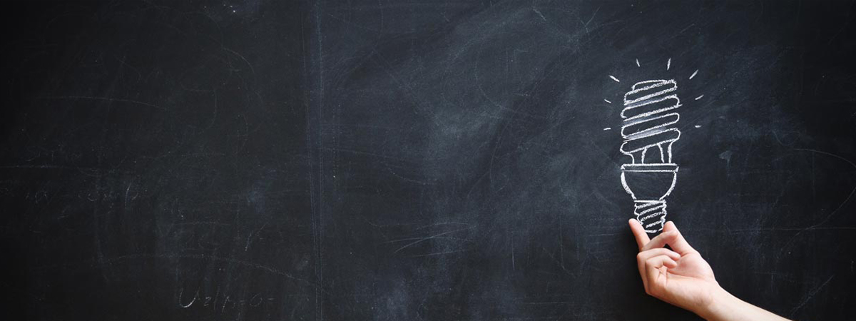 Light bulb drawn on chalkboard