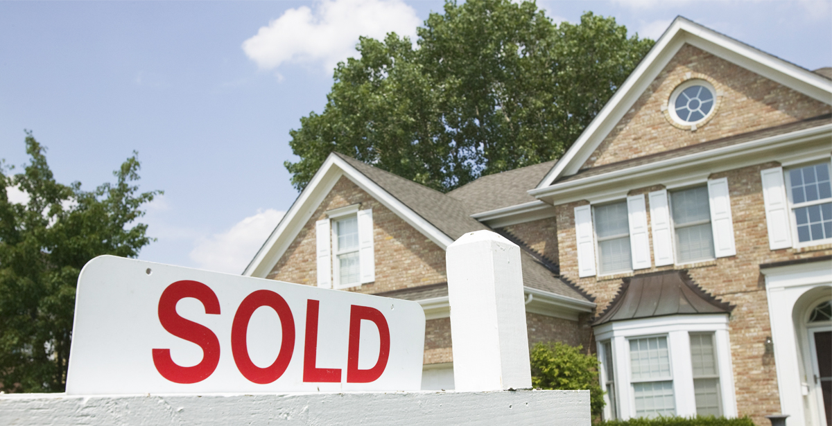 House with a sold sign